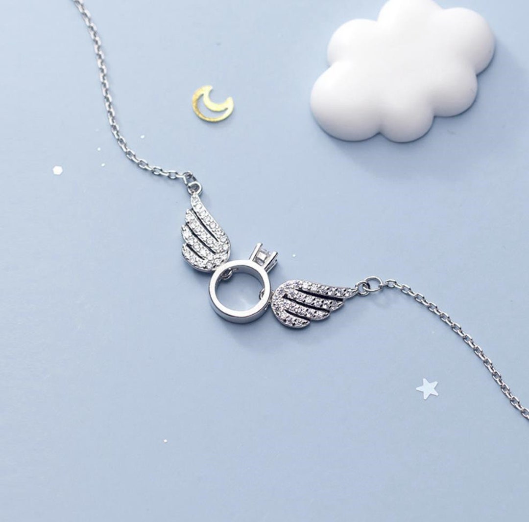 Ring with wings necklace shop