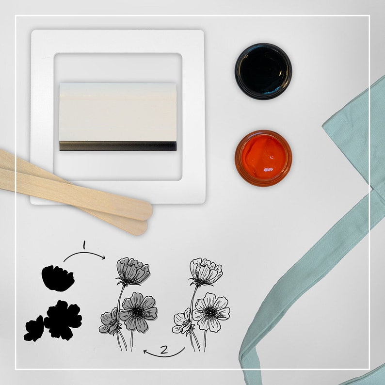 May include: A screen printing kit with two ink colors, black and orange, and a tote bag. The kit includes a squeegee, a stencil with a floral design, and instructions for screen printing.