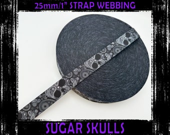 May include: A roll of 25mm (1 inch) wide black webbing with a white and gray paisley pattern. The webbing has the text "SUGAR SKULLS" printed on it.