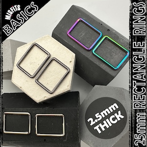 May include: A selection of 25mm rectangle rings in black, gold, and iridescent finishes. The rings are 2.5mm thick. The image includes the text "MISFITS BASICS" and "25mm RECTANGLE RINGS".