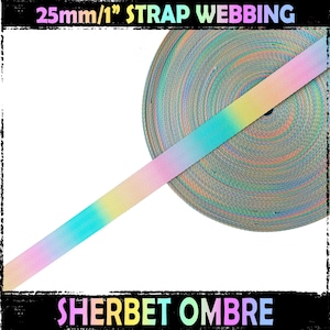 May include: A roll of 25mm (1 inch) wide ombre webbing in a sherbet colour scheme. The webbing is a light blue, pink, and yellow gradient. The text "SHERBET OMBRE" is printed below the roll of webbing.