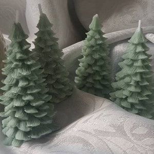 4 Handmade Glittered Christmas Tree Candles. Highly Fragranced And Made From An Eco Soy Pillar Wax.