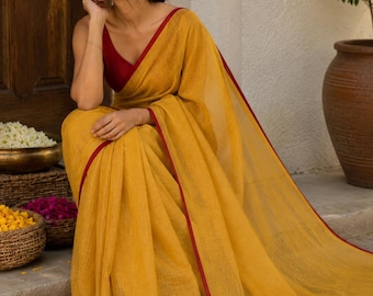 Mustard yellow linen saree with red border lightweight