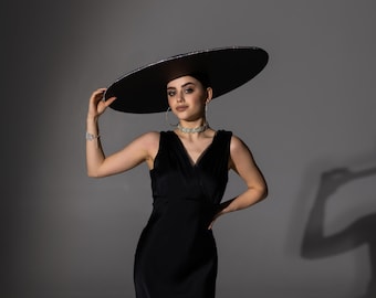 black dress and hat White Woman Black Hat Black Dress Stock Photo 717448537