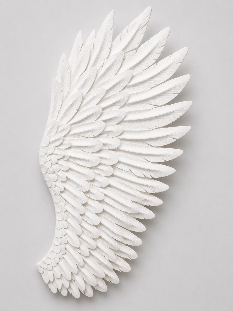 May include: A detailed, white, sculpted wing with layered feathers. The wing is a decorative piece, possibly for wall art or home decor. The feathers are intricately carved, creating a textured surface.