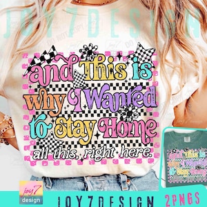 May include: Cream-colored t-shirt with the text "and this is why I wanted to stay home" in colorful, retro-style lettering. The design includes checkered patterns, stars, and flowers, with the phrase "all this, right here" below.