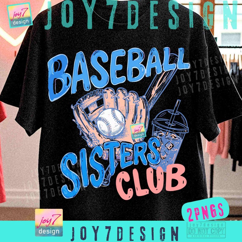 May include: Black t-shirt with a baseball-themed graphic. The design features the word "BASEBALL" in blue, a baseball glove, a baseball, a drink, and the words "SISTERS CLUB" in blue and pink. The shirt has the "joy7 design" logo.