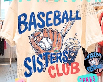 May include: Cream-colored t-shirt featuring a baseball-themed graphic. The design includes a baseball, glove, bat, and a drink, with the words "BASEBALL SISTERS CLUB" in blue and red. A small logo is in the bottom right corner.