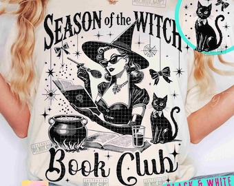 May include: Cream-colored t-shirt with a black and white graphic of a witch reading a book, a cauldron, and a black cat. Text reads "Season of the Witch Book Club" and "Trendy PNGs".