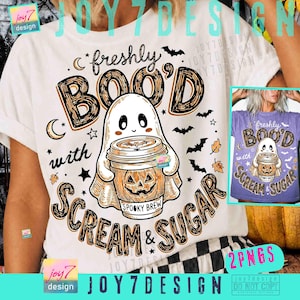May include: A white t-shirt featuring a graphic of a ghost holding a coffee cup with a jack-o'-lantern face. The text reads "freshly BOO'D with SCREAM & SUGAR" and "SPOOKY BREW" on the cup, surrounded by small bats, stars, and crescent moons.