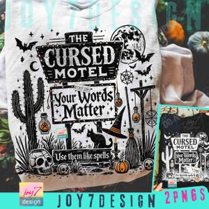 May include: White t-shirt with a black and white Halloween-themed graphic. The design includes a sign that reads "The Cursed Motel" and "Your Words Matter." Other elements include bats, a witch's hat, a black cat, and a skull. The text "Use them like spells" is also present.