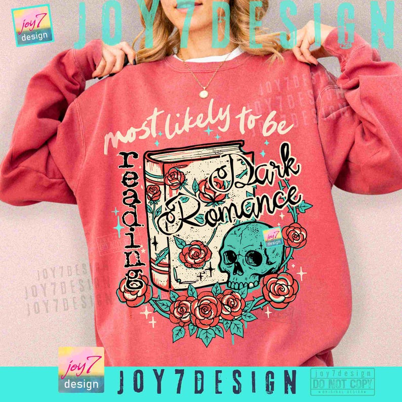 May include: A coral-colored sweatshirt featuring the text "most likely to be reading Dark Romance." The design includes a book, roses, and a teal skull. The sweatshirt has long sleeves and a crew neck.