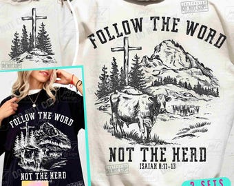 May include: A black and white graphic design featuring a cross, trees, and a cow, with the text "FOLLOW THE WORD NOT THE HERD" and "ISAIAH 8:11-13". The design is on a black t-shirt and a white hoodie.