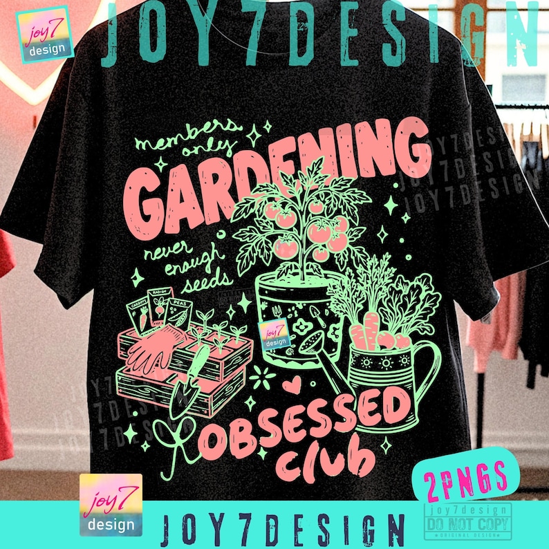 May include: Black t-shirt with a gardening-themed graphic. The design features the words "GARDENING OBSESSED CLUB" in pink and green, along with illustrations of plants, gardening tools, and the text "members only, never enough seeds."