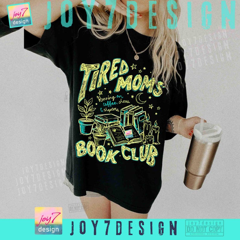 May include: Black t-shirt featuring a neon green and yellow graphic. The graphic says "Tired Moms Book Club" with illustrations of books, plants, and candles. The text "Running on coffee, chaos & chapters" is also included.