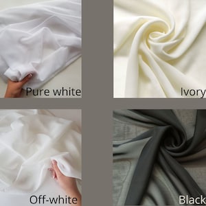 May include: Four fabric swatches in different colours: pure white, ivory, off-white, and black. The fabric is sheer and has a soft, flowing texture.