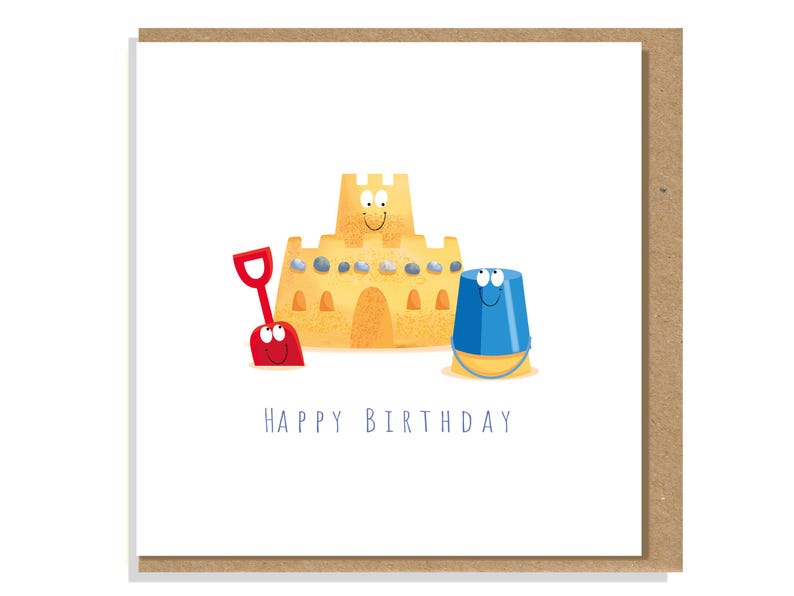 May include: A square greeting card featuring a cartoon illustration of a tan sandcastle with a smiling face, a red plastic shovel, and a blue plastic bucket with a face. The text HAPPY BIRTHDAY is printed in blue below the illustrations.