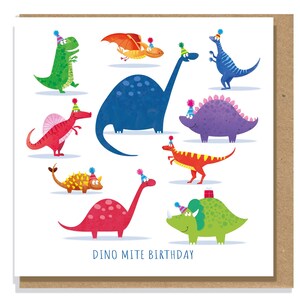 May include: A square greeting card featuring a collection of colourful cartoon dinosaurs wearing party hats. The dinosaurs are green, blue, red, purple, orange, and yellow. The text DINO MITE BIRTHDAY is printed in blue at the bottom centre.