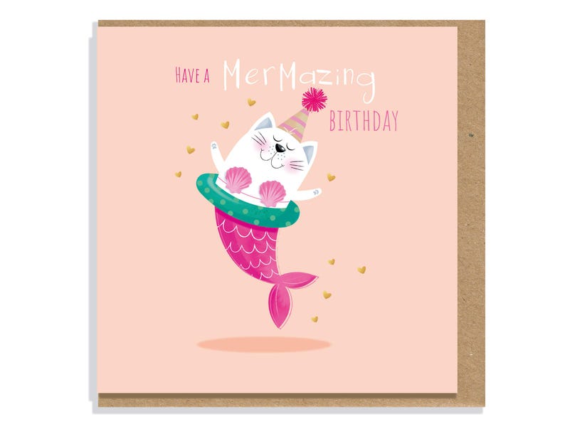 May include: A square greeting card with a light pink background featuring a white cat dressed as a mermaid with a pink tail, a teal inner tube, and a party hat. The text reads "HAVE A MERMAZING BIRTHDAY" with small gold heart accents.