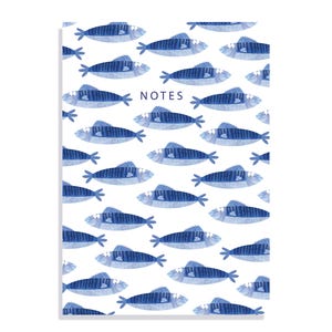 May include: A notebook featuring a pattern of blue watercolour fish on a white backdrop. The word "NOTES" is printed in dark blue. The rectangular notebook has a clean, modern design, suitable for jotting down notes.