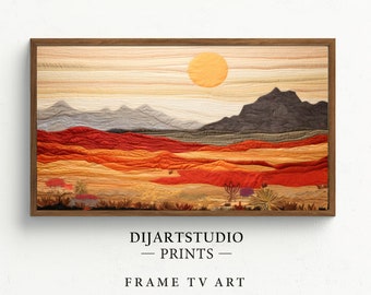 May include: A framed print of a desert landscape with mountains, a sun, and a variety of colors, including red, orange, yellow, and brown. The print is titled "DIJARTSTUDIO - PRINTS - FRAME TV ART".