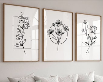 May include: Three black and white line art prints of floral designs. The first print features a single stem with leaves and berries. The second print features a cluster of flowers with a circle around them. The third print features a cluster of flowers with a hexagon around them.