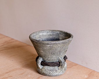 Vintage handmade/rustic/green clay vase with twig ‘belt’