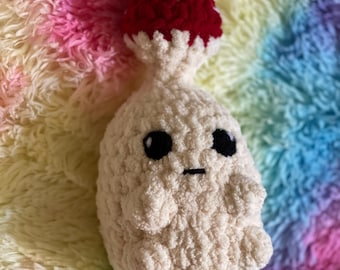 かぎ針編みのマッシュルームボーイのぬいぐるみ、あみぐるみの