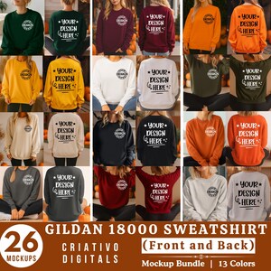 May include: A mockup bundle of Gildan 18000 sweatshirts in various colors, showcasing front and back designs. Each sweatshirt features a small circular design on the front and the text "YOUR DESIGN HERE" on the back. The image includes 26 mockups and 13 colors.