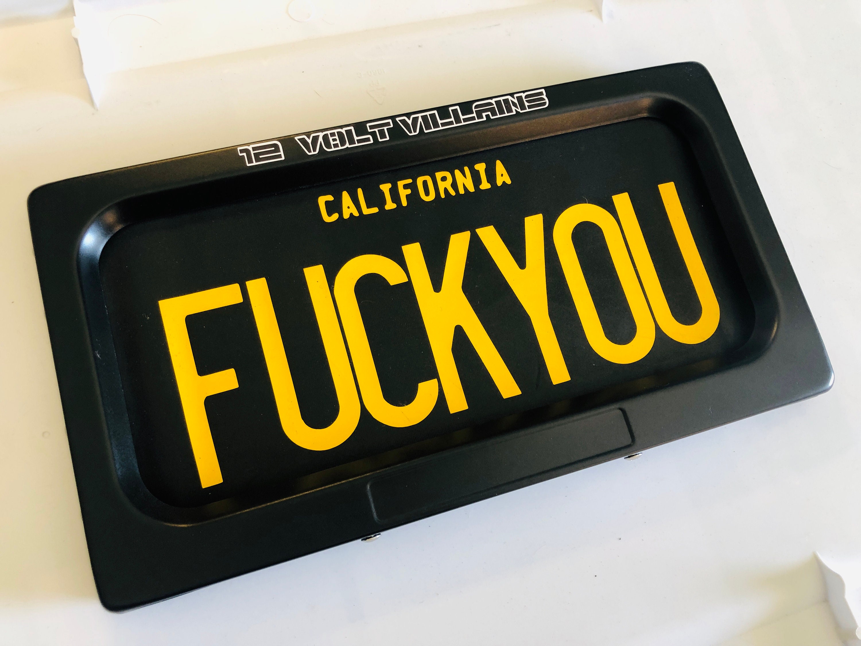 Electric license plate cover