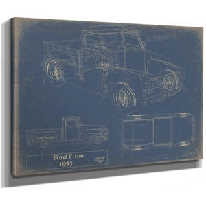 May include: A blue canvas print featuring a technical blueprint of a 1953 Ford F-100 truck. The artwork displays the vehicle in three views: an isometric perspective, a side profile, and a top-down view, all rendered in thin, light-colored lines.