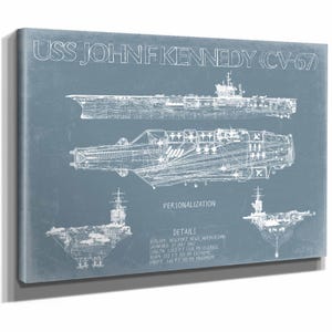 May include: A canvas print featuring a blueprint of the USS John F. Kennedy (CV-67) aircraft carrier. The design includes multiple views and details such as length, beam, and draft measurements in feet. The text is white on a blue background.