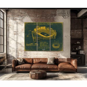 a living room with a couch and a painting on the wall