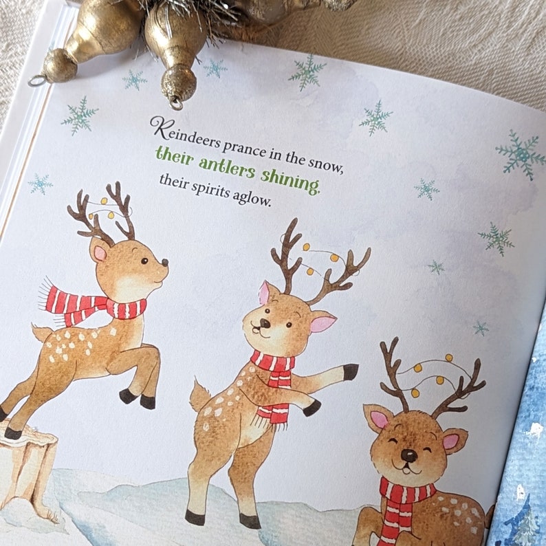 May include: A children's book illustration featuring three reindeer with brown fur, wearing red and white striped scarves. The reindeer have antlers adorned with lights and are set against a snowy backdrop with snowflakes. Text reads, "Reindeers prance in the snow, their antlers shining, their spirits aglow."