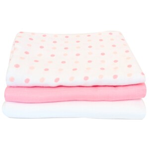 May include: A stack of three baby blankets. The top blanket is white with pink polka dots. The middle blanket is solid pink, and the bottom blanket is solid white. The blankets are folded neatly.