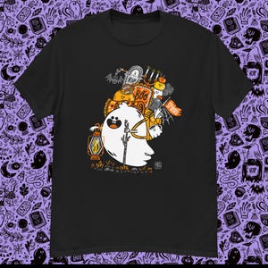 May include: Black t-shirt featuring a cartoon ghost holding a lantern and a staff, with a collection of Halloween-themed objects. The design includes pumpkins, tombstones, and the word "Boo". The shirt is a crew neck.