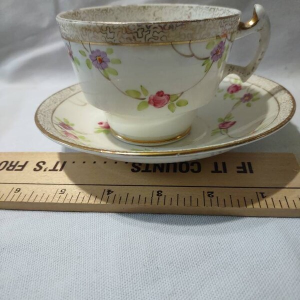 Tea cup and saucer Phoenix