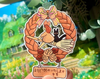 Braided Bread Wreath Broom Girl Sticker – Cottagecore Witch Flying with Cat | Cozy Anime-Inspired Vinyl Sticker