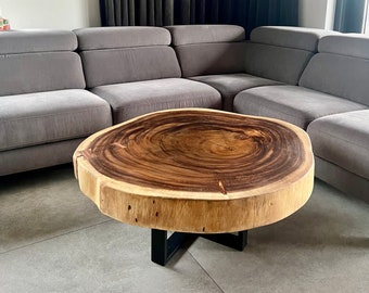 A large coffee table made of exotic suar wood