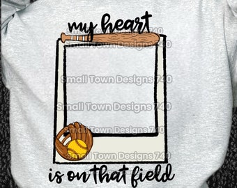 May include: Grey sweatshirt with the text "my heart is on that field" and a picture of a baseball and bat inside a white frame.