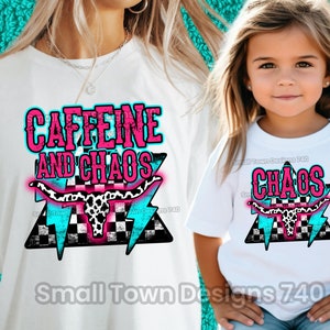May include: White t-shirts with a pink and blue graphic design featuring a cow skull, lightning bolts, and checkered pattern. The larger shirt says "CAFFEINE AND CHAOS" and the smaller shirt says "CHAOS".