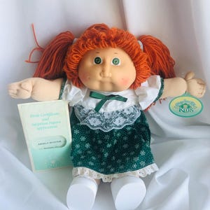 Vintage 1985 Coleco Cabbage Patch Doll: Red Pigtails, Green Dress & Adoption Papers