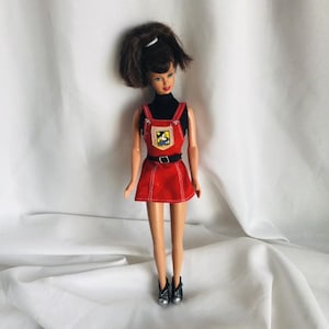 Disney Brunette Barbie in Mickey Mouse Outfit, Dress, and Boots. Back of Dolls head says 1990-Mattel