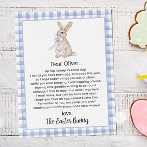 May include: An Easter-themed scene with a letter, cookies, and a gift. The letter, addressed to Oliver, features a watercolor bunny illustration and a blue gingham border. Decorated cookies include bunny, egg, and carrot shapes. A white gift box is tied with a yellow ribbon.