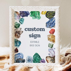 May include: White frame with a watercolor illustration of various gemstones surrounding the text "custom sign" and "editable 8x10 sign".