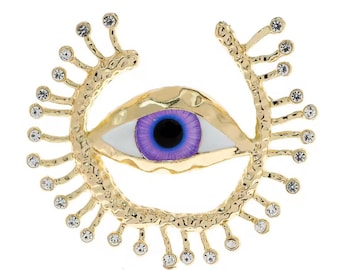 Broche de ojo dorado, pieza de moda