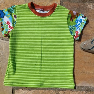 Camiseta el pequeño topo Pauli primavera patinaje verde talla 98