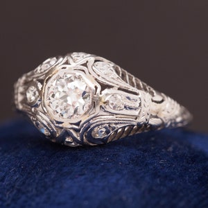 Circa 1920s Platinum Art Deco .50ct total weight Diamond Engagement Ring -