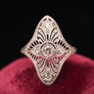 Circa 1920s Platinum Art Deco Filigree Old European Diamond Shield Ring