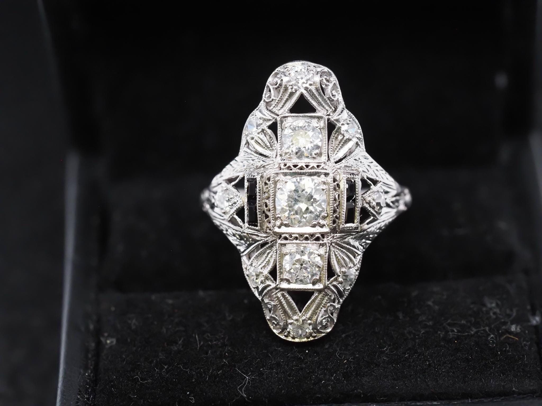 Circa 1920s Pltainum Old European Diamond and Onyx Ring
